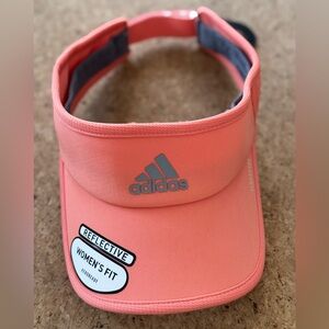 Adidas Peach color Visor, one size, adjustable back strap, new w/ tags.